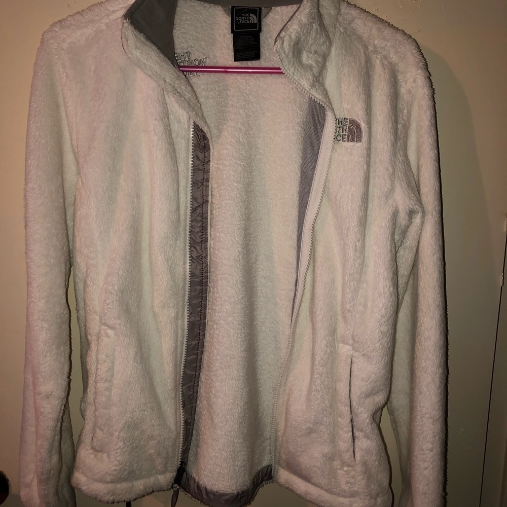 White fuzzy North Face